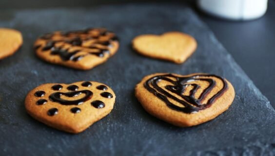 Delicious chocolate on heart-shaped cookies cookie chips