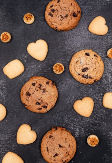 small heart-shaped cookies with chocolate cookies chips