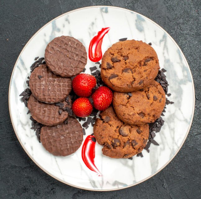 cookies and strawberries on plate